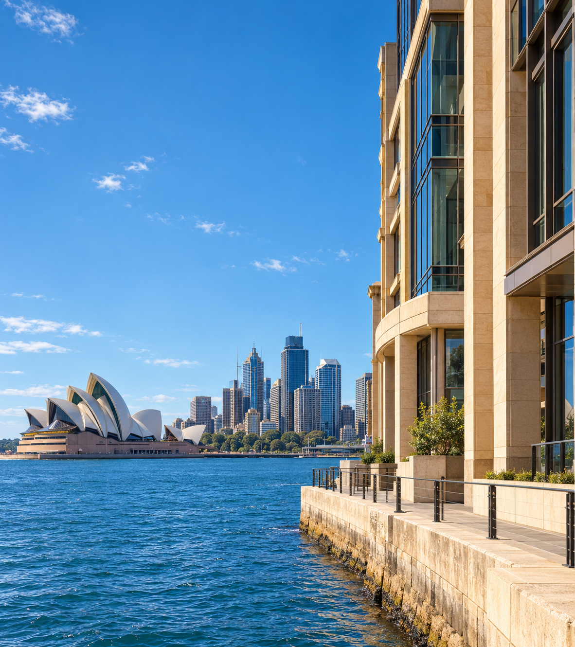 Illustrative view of Sydney Opera House and harbour beside a sandstone waterfront building